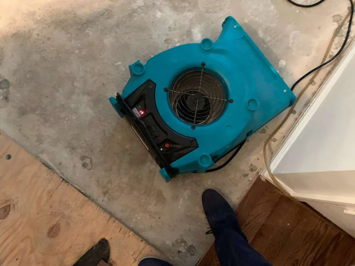 Air mover drying subfloor during Leak Detection & Repair in Cedar City